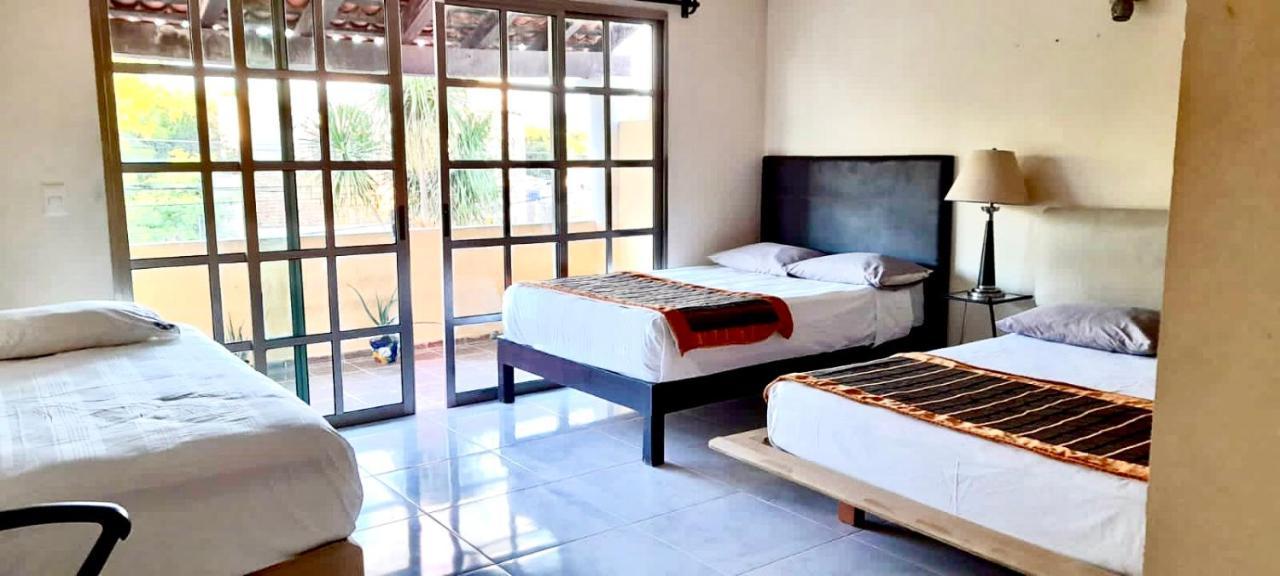 Quarto em Acomodações Particulares La Maison Bleue